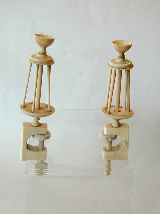 A Pair of 19th Century Ivory Sewing Clamps with Bird Cage Winders