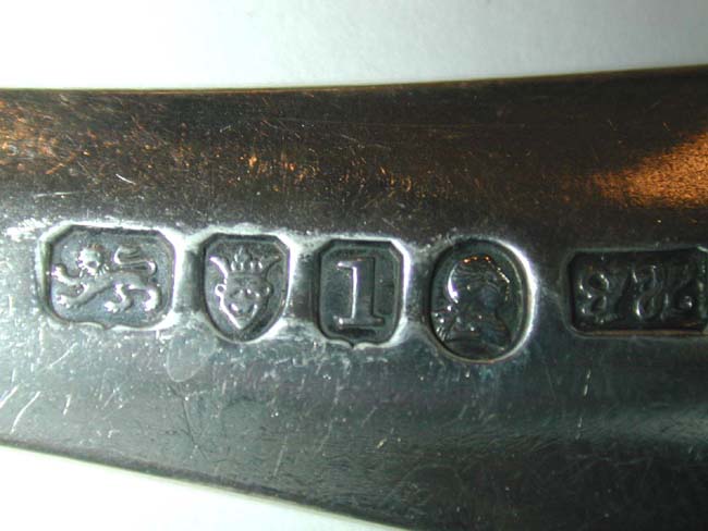 A Set of Four Engraved Bright-Cut Sterling Silver Tablespoons by HESTER BATEMAN, London 1786. — image 2