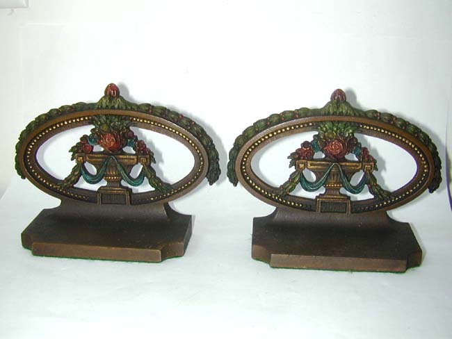 A Pair of BRADLEY & HUBBARD Painted Flower Basket Bookends Circa 1900