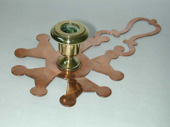 A Late 18th or early 19th Century Dutch Brass and Copper Chamberstick