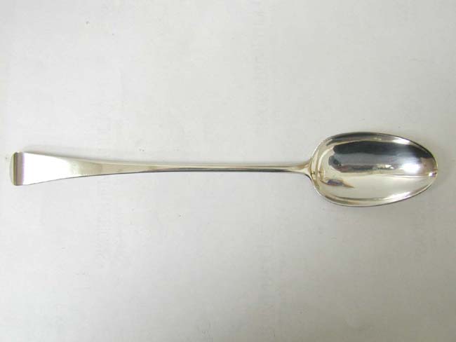 A Large English Sterling Silver Basting Spoon by Elias Cachart, London 1750.