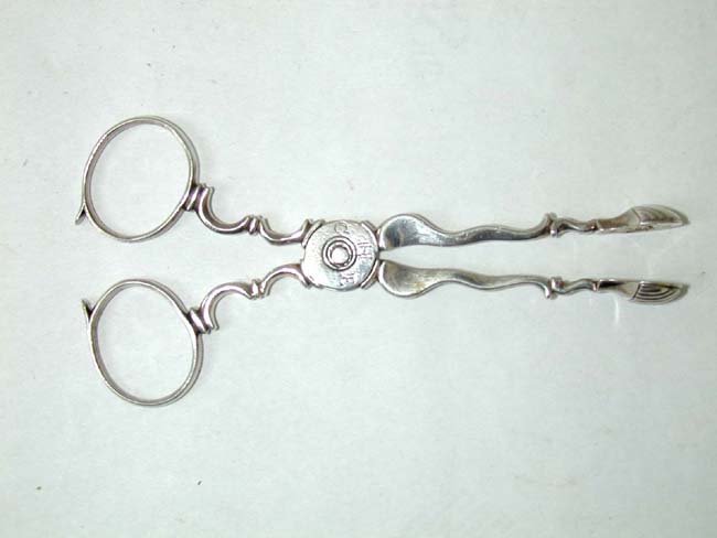 A Pair of 18th Century Silver Sugar Nips, Possibly by Jonathan Clarke of Newport, R.I., circa 1740
