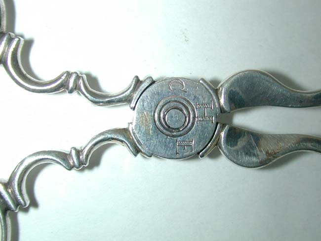 A Pair of 18th Century Silver Sugar Nips, Possibly by Jonathan Clarke of Newport, R.I., circa 1740 — image 2