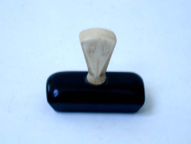 A 19th century Whaler's Log Book Stamp-Coffin shaped.