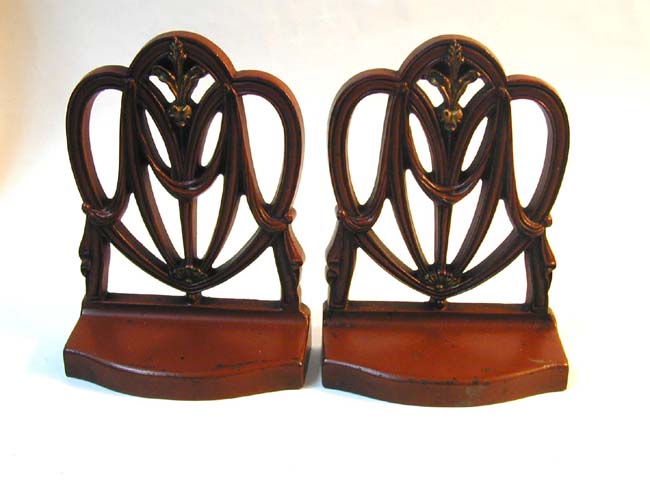A Pair of Antique Bookends by BRADLEY & HUBBARD Depicting a "Hepplewhite" Period Chair Back, circa 1920.