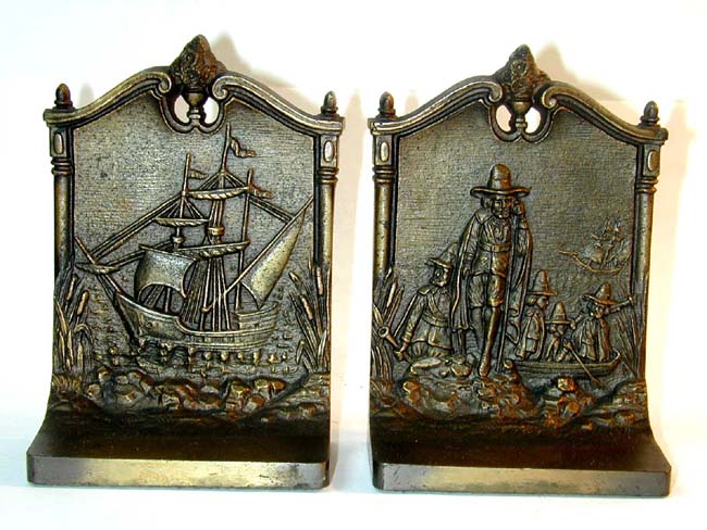 A Fine and Rare Pair of Antique Bookends by BRADLEY & HUBBARD Depicting "The Mayflower" and the Pilgrims Landing at Plymouth.