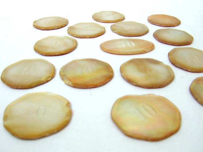 A Collection of Mid 19th Century Thick Hand Cut Mother-of-Pearl Gambling Chips circa 1850