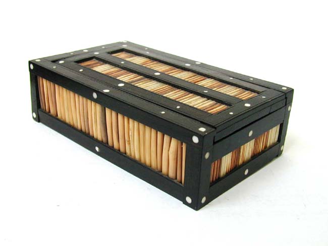 A fine set of 19th century Bone and Ebony Dominoes in a Rare Ebony and Porcupine Quill Box circa 1870.