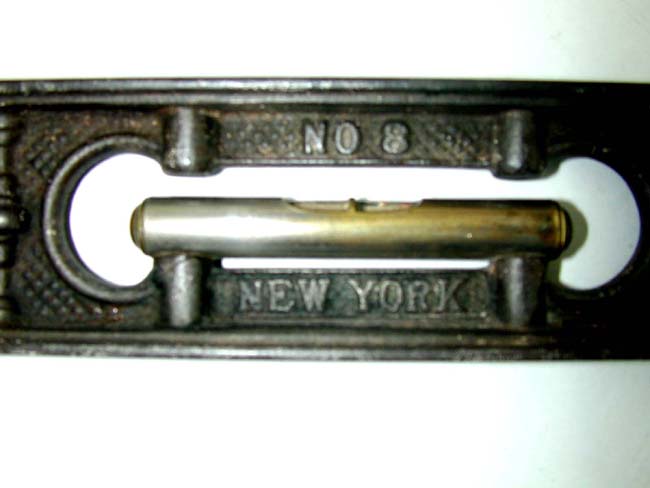 An Antique Decorative Cast-Iron Level Marked "M.W. ROBINSON, No. 8, New York, circa 1870 — image 2