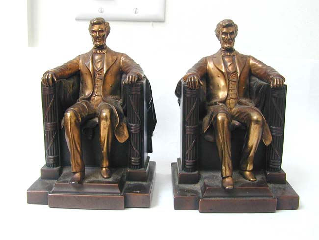 A Pair of Abraham Lincoln "Sitting in the Chair" Bookends by Jennings Brothers circa 1930