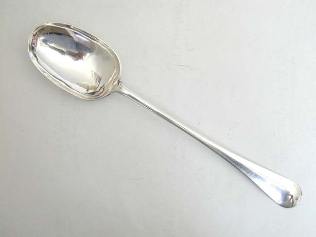 An important American Silver Stuffing Spoon by Robert Fairchild of Stratford, Connecticut made for Charity Johnson, wife of Dr. Samuel Johnson, first President of King's College (Columbia University) circa 1750.