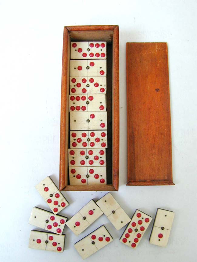 An Unusual Cased Set of 24 Bone and Ebony Dominoes with Red Dots circa 1890 — image 2