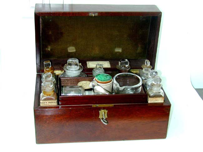 A 19th Century English Apothecary Set in a Mahogany Case circa 1830