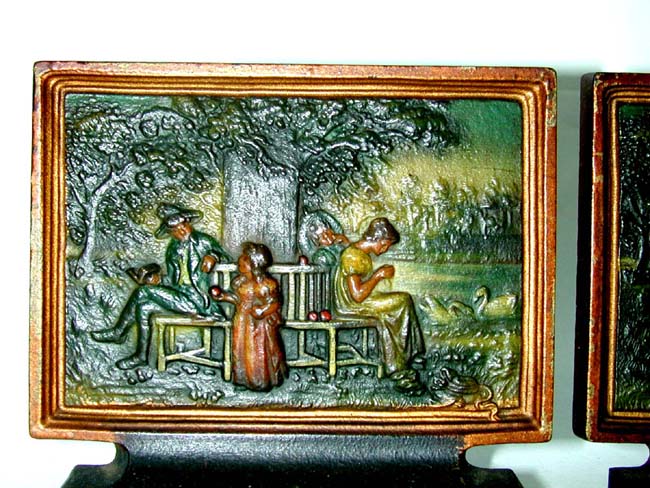 A Charming pair of Bradley & Hubbard Antique Bookends Depicting a Family Sitting Under a Tree