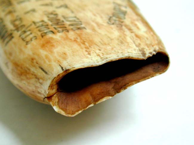 An Scrimshawed Whale's Tooth circa 1900-1920 — image 4