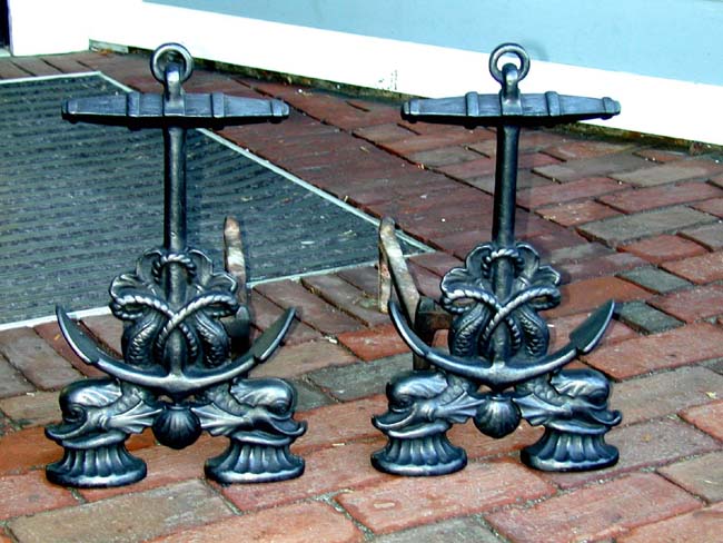 A Pair of 19th Century Dolphin and Anchor Cast-Iron Andirons