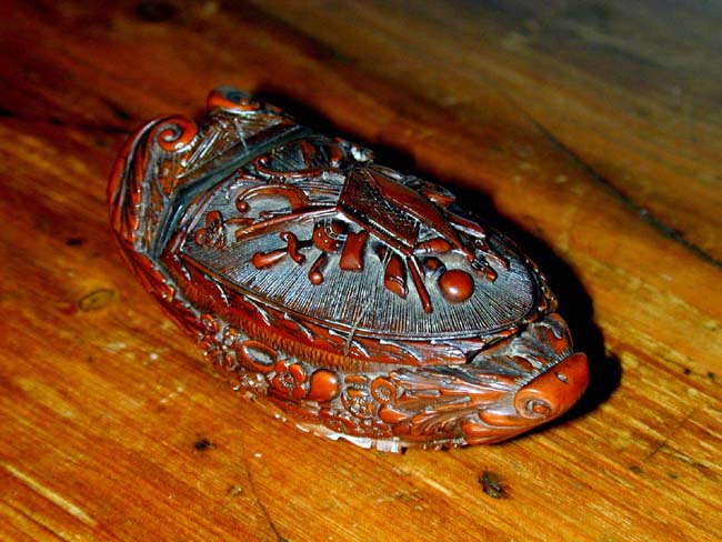 A Napoleonic Period Carved Walnut Snuff Box in the form of a ship circa 1795