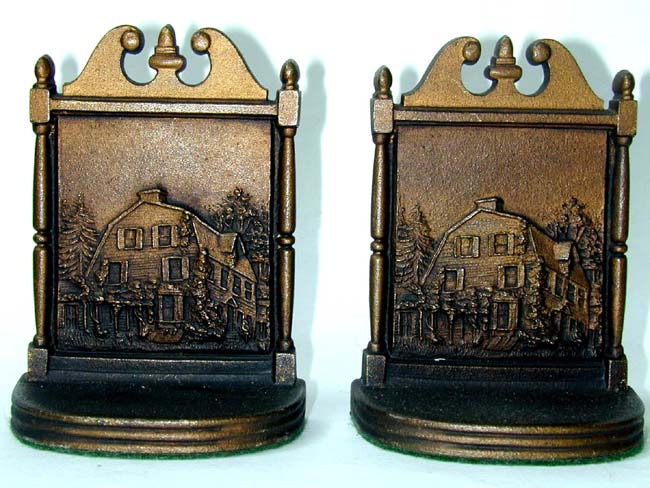 A Pair of Bradley & Hubbard Antique Bookends circa 1920 Depicting a Dutch Colonial Home