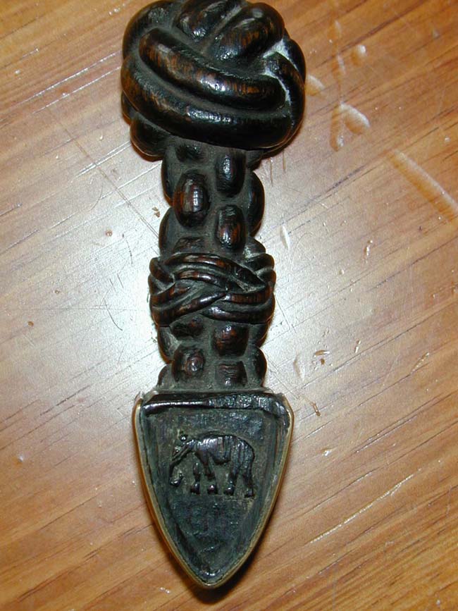 An Elaborately Carved 19th century Wooden Seam Rubber — image 2