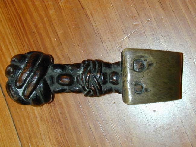 An Elaborately Carved 19th century Wooden Seam Rubber