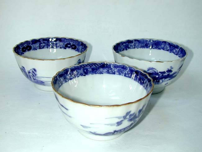 A rare group of three 18th century fluted Chinese Export Porcelain Tea Bowls with gilt highlights circa 1785