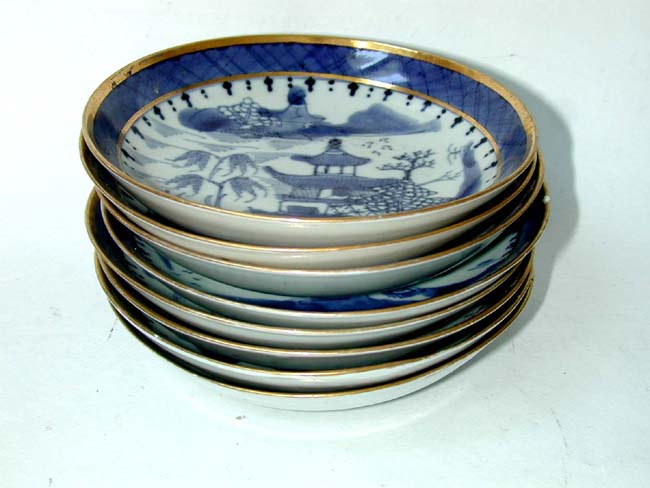 A Fine set of 8 Early 19th century Chinese Export Porcelain 'Imperial Nanking' 5 1/2" saucers with gilt highlights.