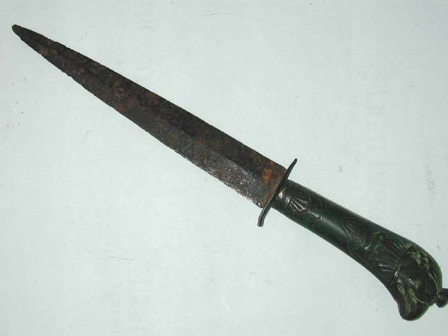 A Revolutionary War period composite knife with brass grip and Eagle head pommel
