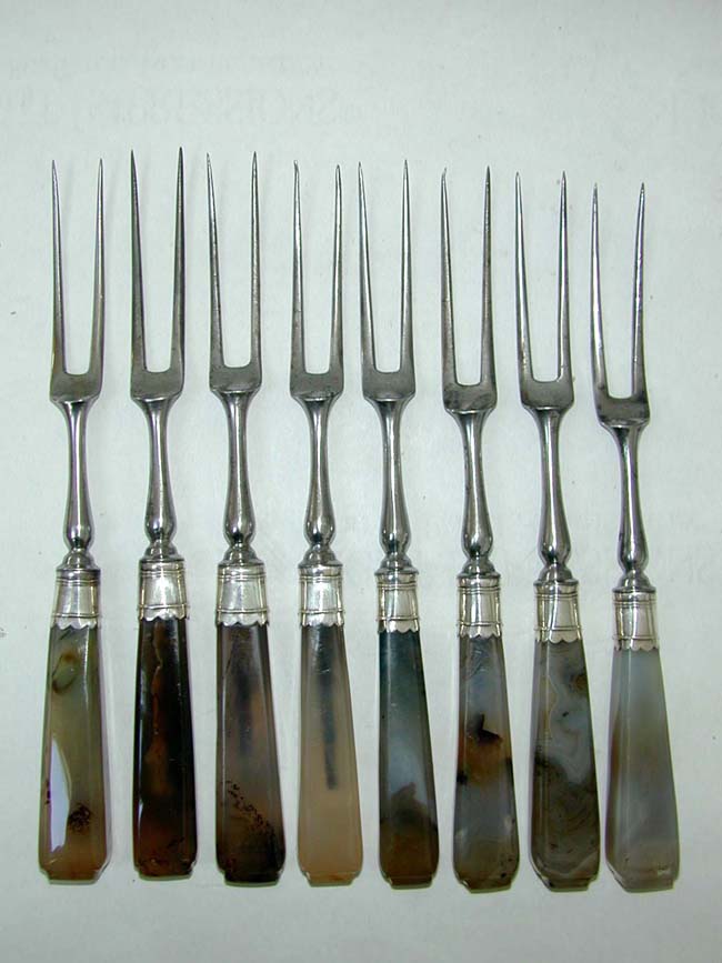 A fine Set of 8 Silver Mounted Two Prong Forks and 8 Matching Knives All with Agate Handles circa 1750.
