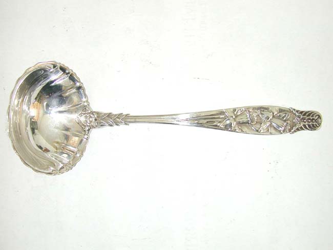 A Late 19th century Sterling Silver Soup Ladle by the Whiting Division of Gorham and made for 'Bailey, Banks and Biddle.'