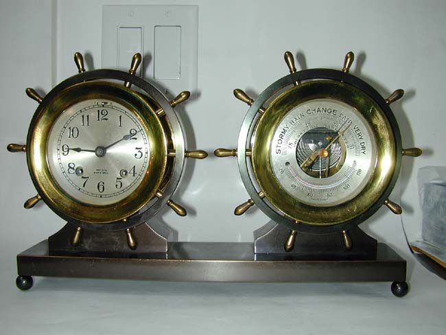 A Chelsea Ship's Bell Clock and Barometer Set circa 1930.
