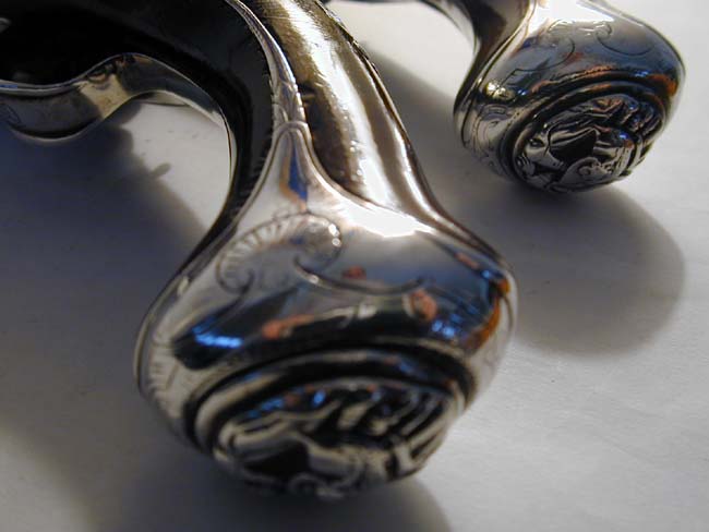 A Nice Pair of Silver-Mounted Flintlock Holster Pistols with Brass Barrels signed 'J. Henshaw, London,' one hallmarked 1749, the other 1754 — image 7