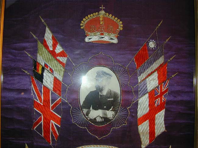 A Fine Sailor's Silkwork Featuring a Depiction of H.M.S. SUFFOLK and a photo of the Ship's Captain circa 1930 — image 4