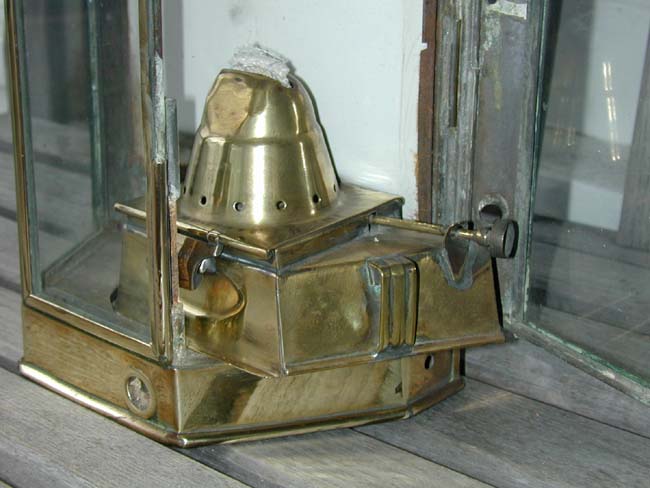 A Ship's Bulkhead Lamp with original burner and rare porcelain reflective back plate by Bulpitt, circa 1902. — image 4