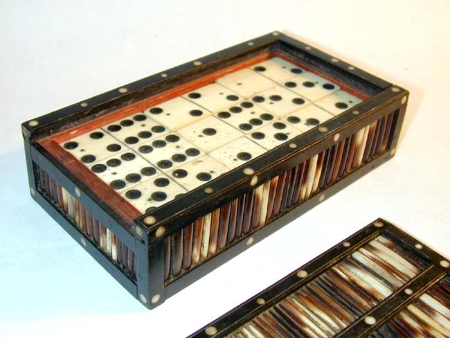 A Beautiful Set of 28 Antique Bone and Ebony Dominoes together with an Antique Porcupine Quill and Inlaid Ivory Box circa 1875