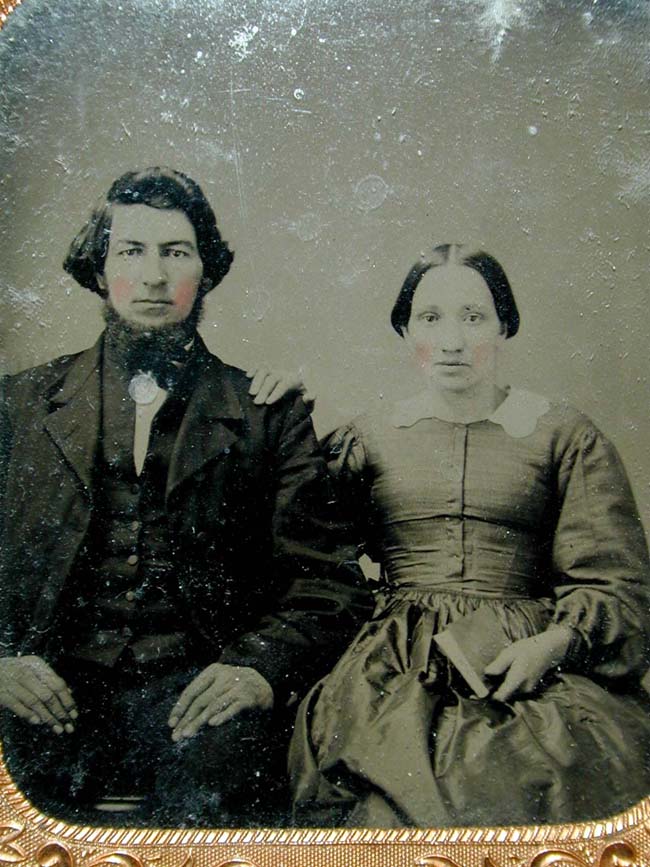 A Mid 19th century Ambrotype of a seated Lady and Gentleman