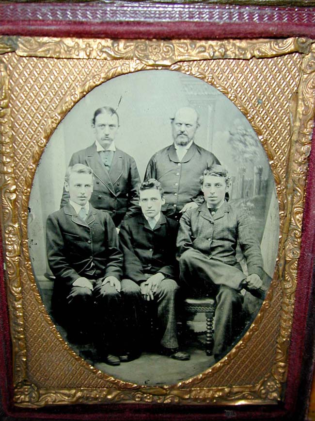 A late 19th century Ambrotype (?) Image of Three Young Men with Two Gentlemen