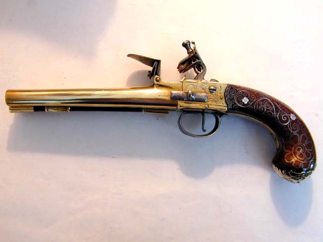 A Magnificent 18th century British Double Barrelled   Silver mounted Flintlock Pistol by John Parkes of London circa 1770.