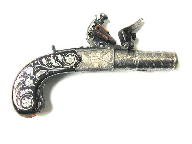 A Museum Quality Pair of Flintlock Pocket Pistols inlaid with Gold and Silver by John George Lacy, London, circa 1810-1814. — image 2