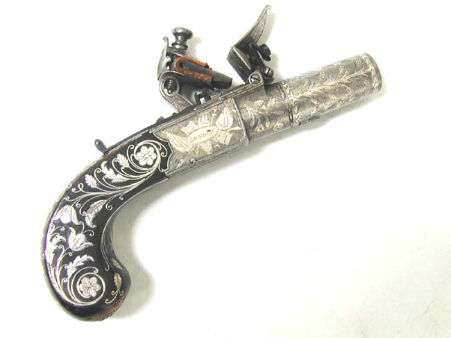 A Museum Quality Pair of Flintlock Pocket Pistols inlaid with Gold and Silver by John George Lacy, London, circa 1810-1814. — image 11