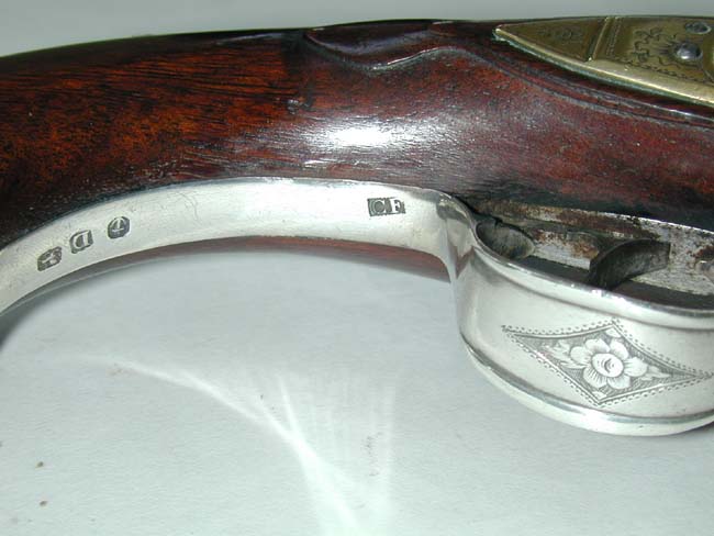 An Exceptionally fine and rare pair of English Naval Officer's Silver Mounted Brass Barrelled Flintlock Pistols by Joseph Bunney, London, 1776. — image 8