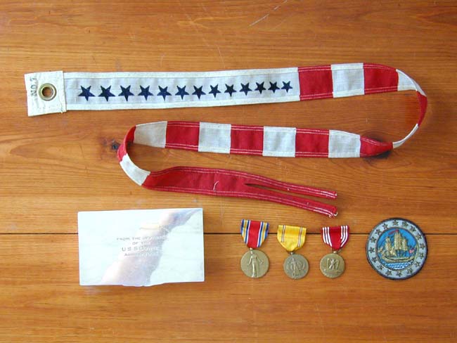 The Commissioning Pennant and other Memorabilia from the U.S.S. Cowie circa 1942