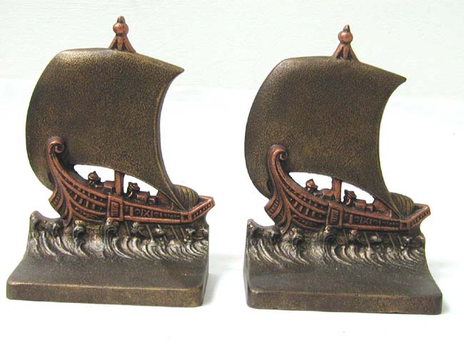 A Pair of Antique bookends by Bradley & Hubbard circa 1925 depicting a Phoenician or Roman trading ship