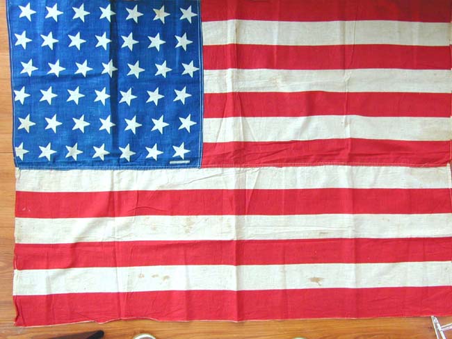 A Fine 42 Star Flag in the 'Tumbling Star' formation circa 1890, now in an elegant gilt frame