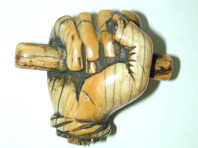 A Wonderful 19th century Sailor-Carved Whale  Ivory 'Clenched Fist' cane knob circa 1840