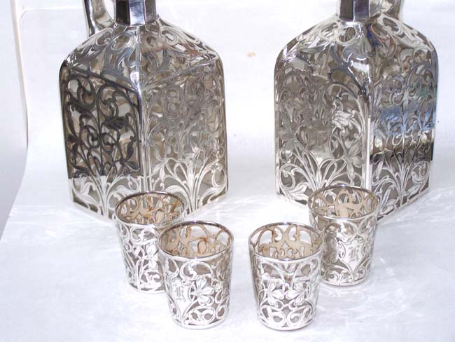 A Beautiful Pair of Late 19th century Silver Overlay Decanters with Four Matching Tumblers — image 2