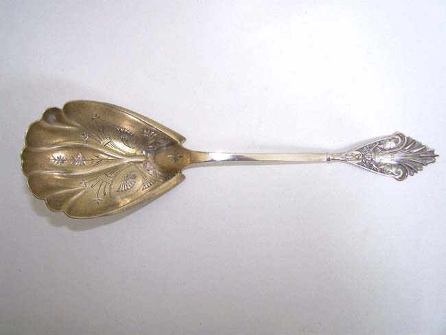 A Fine American Sterling Silver Serving Spoon by Seth P. Squire of New York City circa 1845-1853