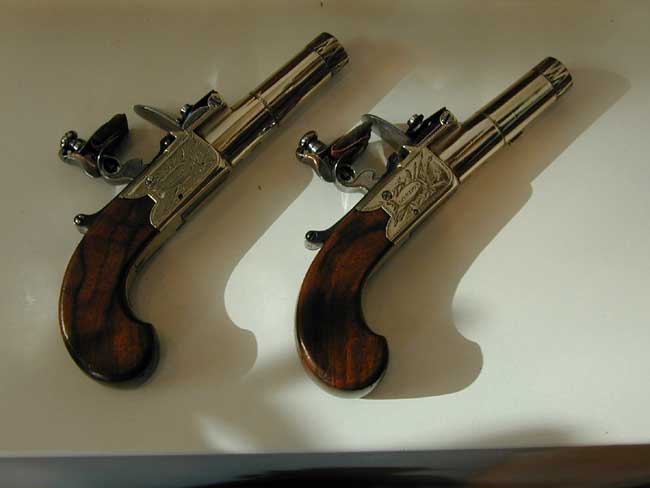 A Rare Cased Set of Paktong Mounted Flintlock Pocket Pistols circa 1790.