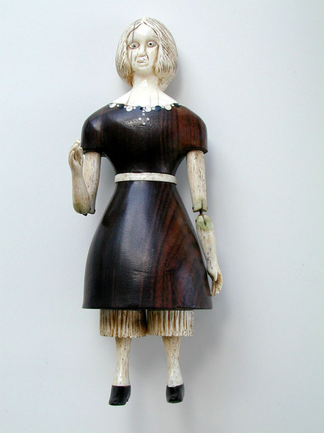 A Whale Ivory and Whalebone Mounted Reticulated Doll
