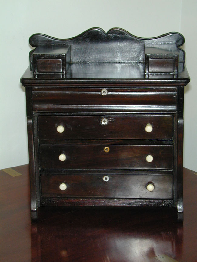 A 19th Century Miniature Empire Style Chest of Drawers