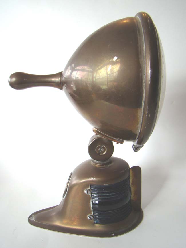An attractive vintage Perkins Marine Lamp Co. (PERKO) combination spotlight and port & starboard lamp circa 1930